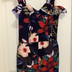 Beautiful floral corset style jumper with pockets!